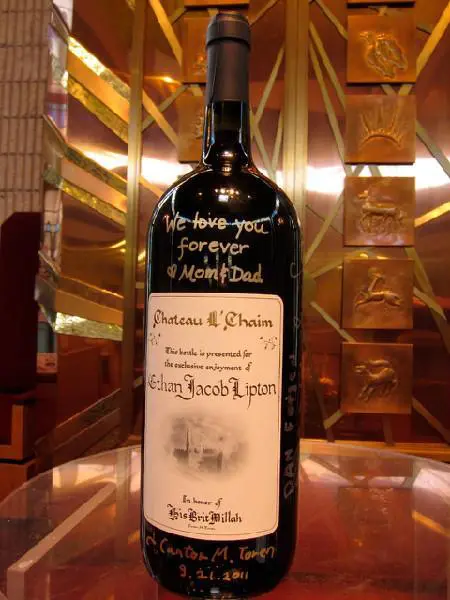 A bottle of wine with writing on it